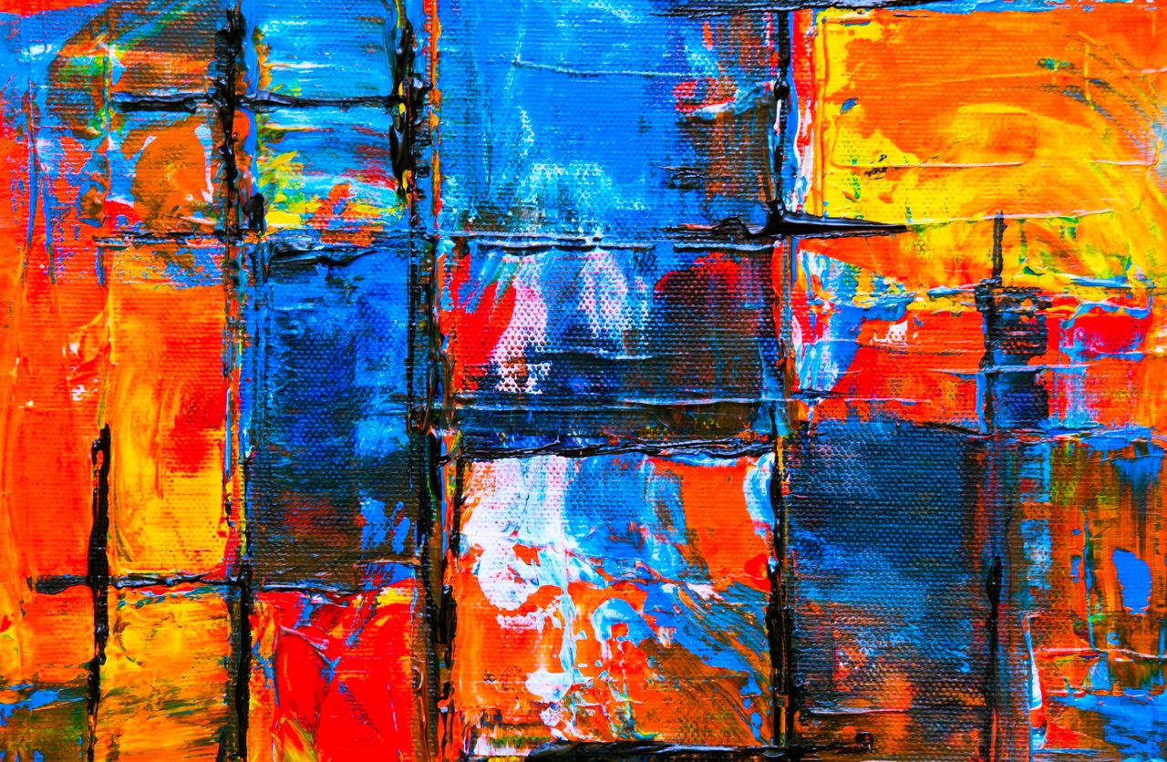 Colorful abstract acrylic painting with vibrant hues and textured layers.